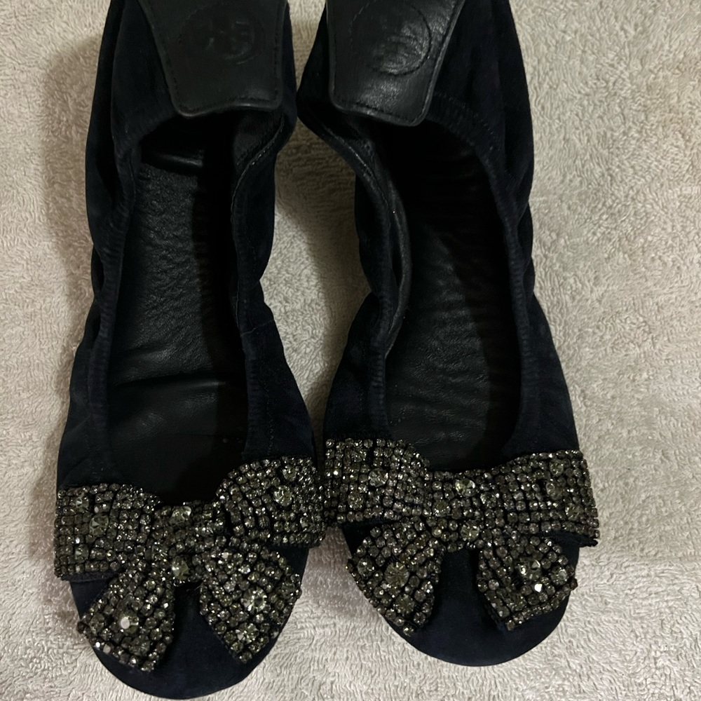 Tory Burch flats. So 8.5 in navy blue with rhinestone bow tie